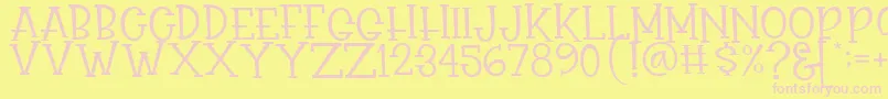 Rasionil Font – Pink Fonts on Yellow Background