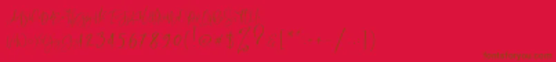 Czcionka RastyKing Regular – brązowe czcionki na czerwonym tle