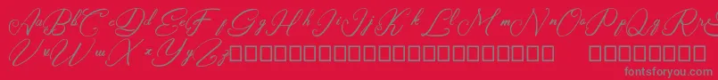 Rasyidin-Schriftart – Graue Schriften auf rotem Hintergrund