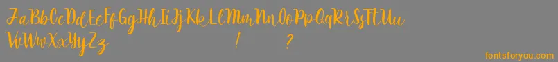 Rathyland Font – Orange Fonts on Gray Background