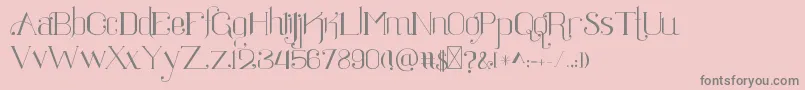 Ratigk-fontti – harmaat kirjasimet vaaleanpunaisella taustalla