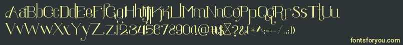 Ratigk Font – Yellow Fonts on Black Background