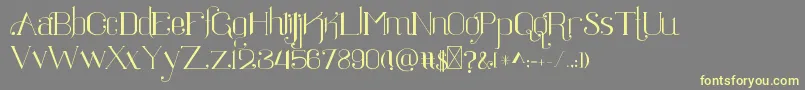 Ratigk Font – Yellow Fonts on Gray Background
