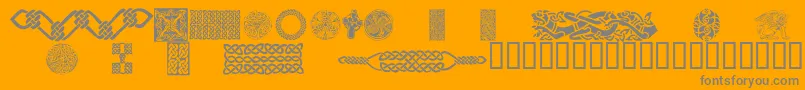 CelticPatterns-Schriftart – Graue Schriften auf orangefarbenem Hintergrund