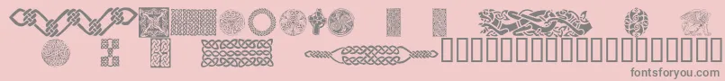 CelticPatterns-Schriftart – Graue Schriften auf rosa Hintergrund