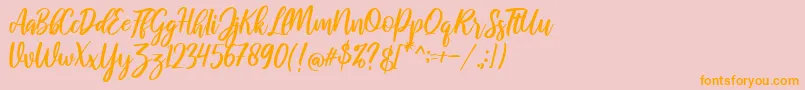 raustila Regular-Schriftart – Orangefarbene Schriften auf rosa Hintergrund