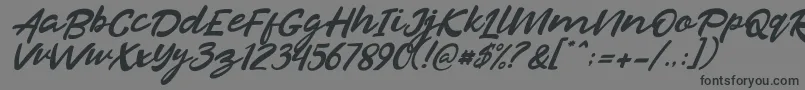 Razan Italic Font – Black Fonts on Gray Background