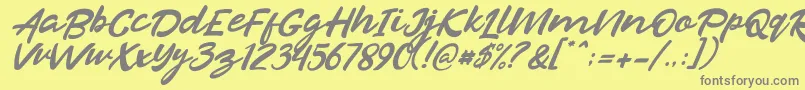 Razan Italic-Schriftart – Graue Schriften auf gelbem Hintergrund