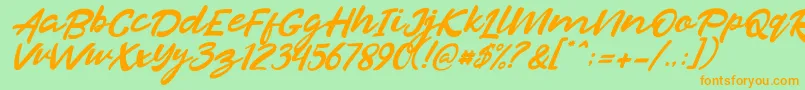 Czcionka Razan Italic – pomarańczowe czcionki na zielonym tle