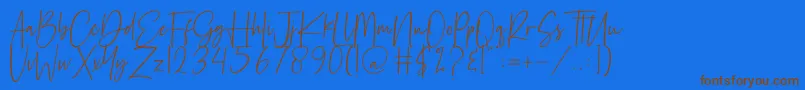 Reactin Font – Brown Fonts on Blue Background