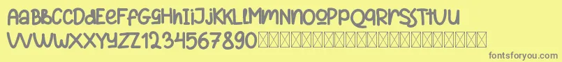 フォントReactivoFree – 黄色の背景に灰色の文字