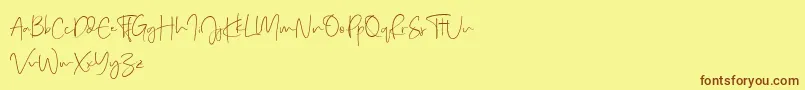 Real Kindly Demo-Schriftart – Braune Schriften auf gelbem Hintergrund