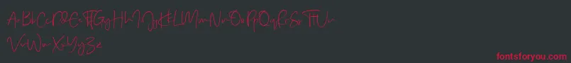 Real Kindly Demo-Schriftart – Rote Schriften auf schwarzem Hintergrund