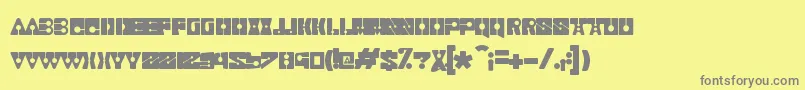 フォントRealismo – 黄色の背景に灰色の文字