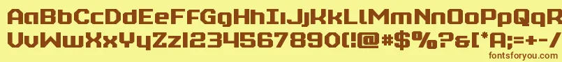 フォントrealpolitiksemibold – 茶色の文字が黄色の背景にあります。