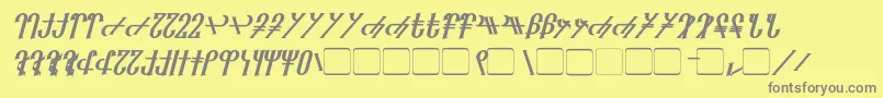 フォントReanaarian Bold Italic – 黄色の背景に灰色の文字