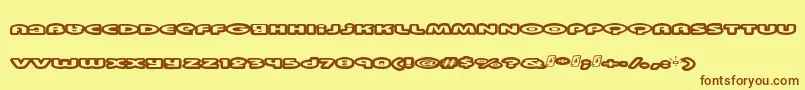フォントSwinkydad – 茶色の文字が黄色の背景にあります。