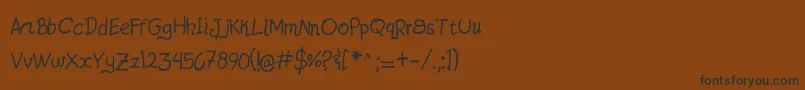 フォントJatzioAlpha – 黒い文字が茶色の背景にあります