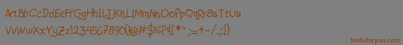 フォントJatzioAlpha – 茶色の文字が灰色の背景にあります。