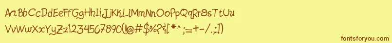 フォントJatzioAlpha – 茶色の文字が黄色の背景にあります。