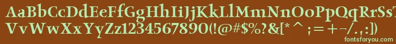 フォントObeliskmditcTt – 緑色の文字が茶色の背景にあります。