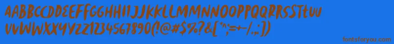 Reborn Revolt Font by 7NTypes Font – Brown Fonts on Blue Background