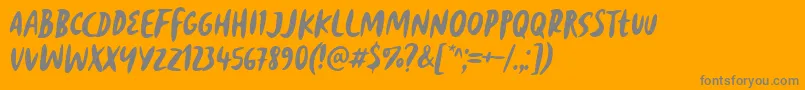 Reborn Revolt Font by 7NTypes-Schriftart – Graue Schriften auf orangefarbenem Hintergrund