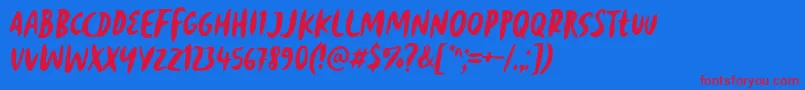 Reborn Revolt Font by 7NTypes Font – Red Fonts on Blue Background