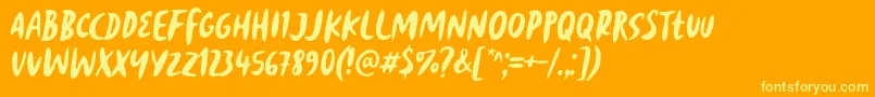 Reborn Revolt Font by 7NTypes-fontti – keltaiset fontit oranssilla taustalla