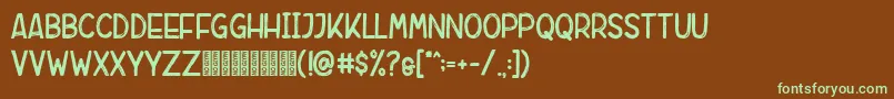 フォントRebrush Demo – 緑色の文字が茶色の背景にあります。