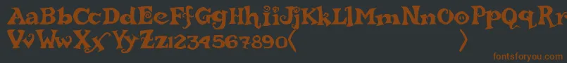 rebucked-Schriftart – Braune Schriften auf schwarzem Hintergrund