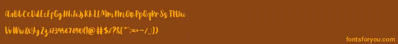 Reckless Brush Font – Orange Fonts on Brown Background