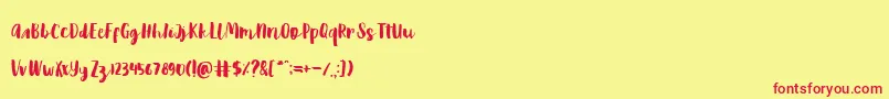 Fonte Reckless Brush – fontes vermelhas em um fundo amarelo