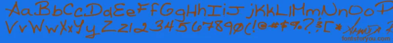 Reed s Writing-Schriftart – Braune Schriften auf blauem Hintergrund