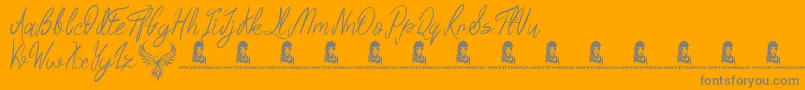 Regal Eagle-fontti – harmaat kirjasimet oranssilla taustalla