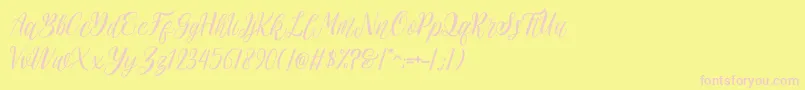rehattyn Font – Pink Fonts on Yellow Background