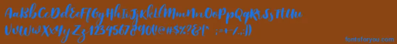 Więcej informacji o czcionce Reklase Czcionka Reklase – niebieskie czcionki na brązowym tle