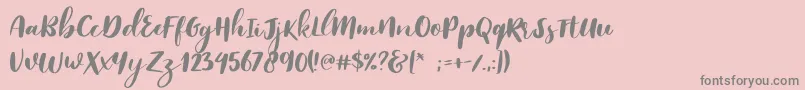 Reklase Font – Gray Fonts on Pink Background