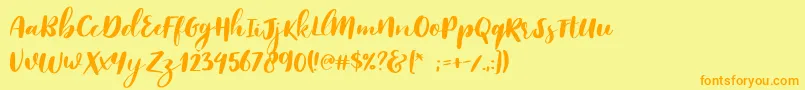 Reklase Font – Orange Fonts on Yellow Background