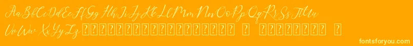 Rembrants Font – Yellow Fonts on Orange Background