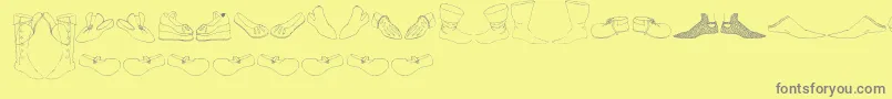 Renaissance Shoes Font – Gray Fonts on Yellow Background