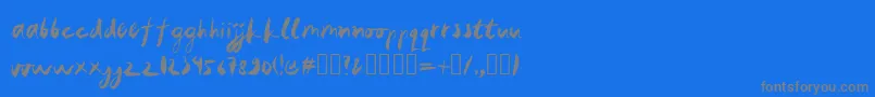 rendangpadang-Schriftart – Graue Schriften auf blauem Hintergrund