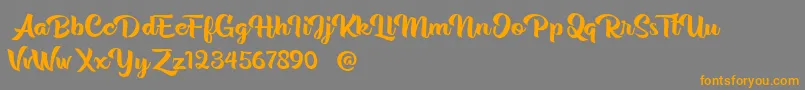 Rentuck-Schriftart – Orangefarbene Schriften auf grauem Hintergrund