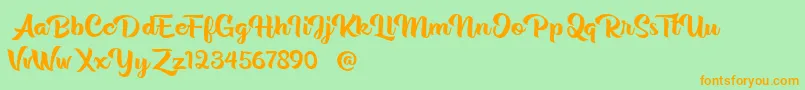 Rentuck Font – Orange Fonts on Green Background