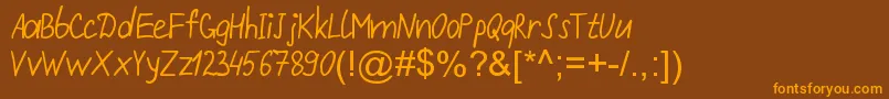 Шрифт Repivmanusc Bold – оранжевые шрифты на коричневом фоне