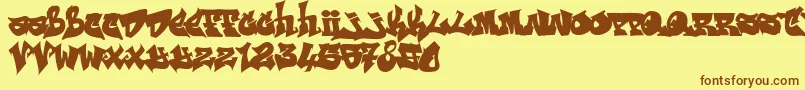 Шрифт RESKAGRAF – коричневые шрифты на жёлтом фоне