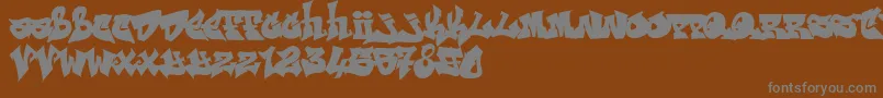 Шрифт RESKAGRAF – серые шрифты на коричневом фоне