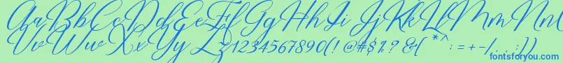 Restiany Script-Schriftart – Blaue Schriften auf grünem Hintergrund