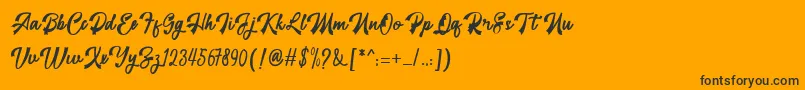 restyla Font – Black Fonts on Orange Background