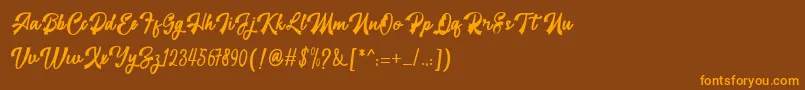 restyla Font – Orange Fonts on Brown Background